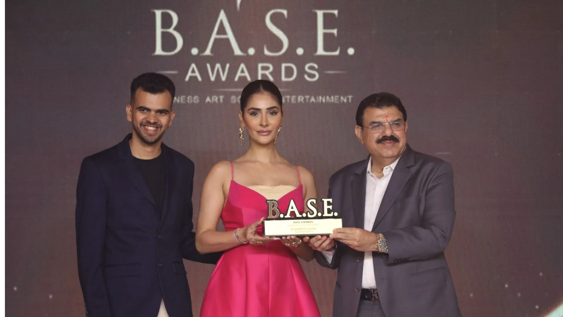 Pravin Kotak - MD JP Iskon Group Ahmedabad giving award to Alankrita Sahaii